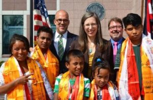 Bhutanese refugee Sahri Maya Thatal (left) and her children with the US Ambassador to Nepal, Alaina B. Teplitz, International Organization for Migration’s Paul Norton, and UNHCR’s Kevin Allen, in Kathmandu. Photo: US Embassy in Kathmandu