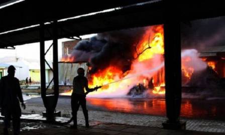 Factory fire kills dozens of sleeping workers