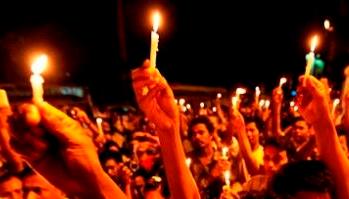 Candles flicker  against CAA, NRC, JNU violence